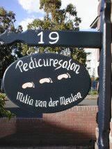 Uithangbord pedicuresalon Milia aan Manhuisveld 19 te Breda